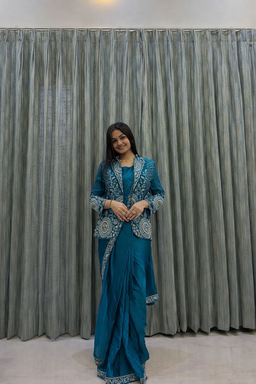 Teal Silk Saree & Embroidered Cape Jacket
